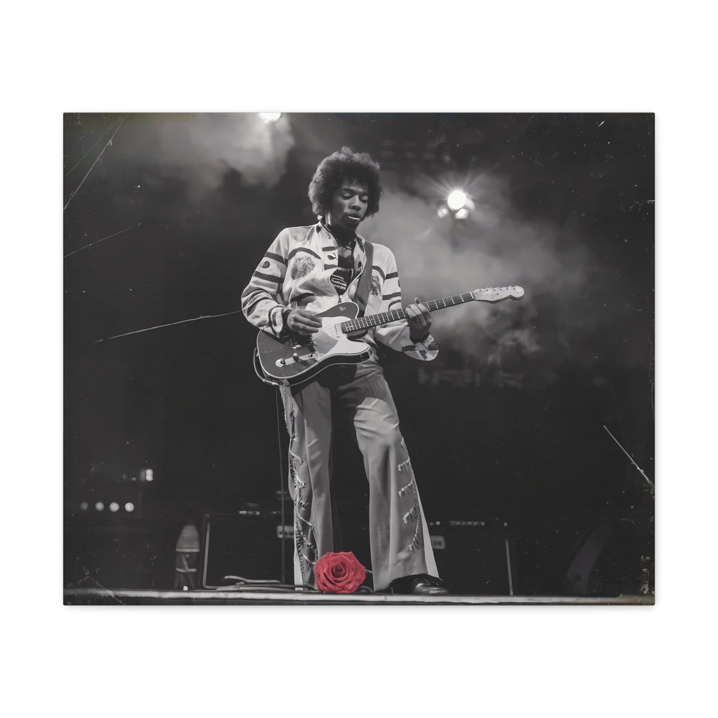 Jimi Hendrix Vintage PerformanceTimeless Passion: Jimi Hendrix Vintage Performance | Canvas Gallery WrCanvasJimi Hendrix Vintage Photo Art - Black and White with Red Rose Accent
Experience the raw energy of Jimi Hendrix through this unique vintage-style canvas. Bring the s