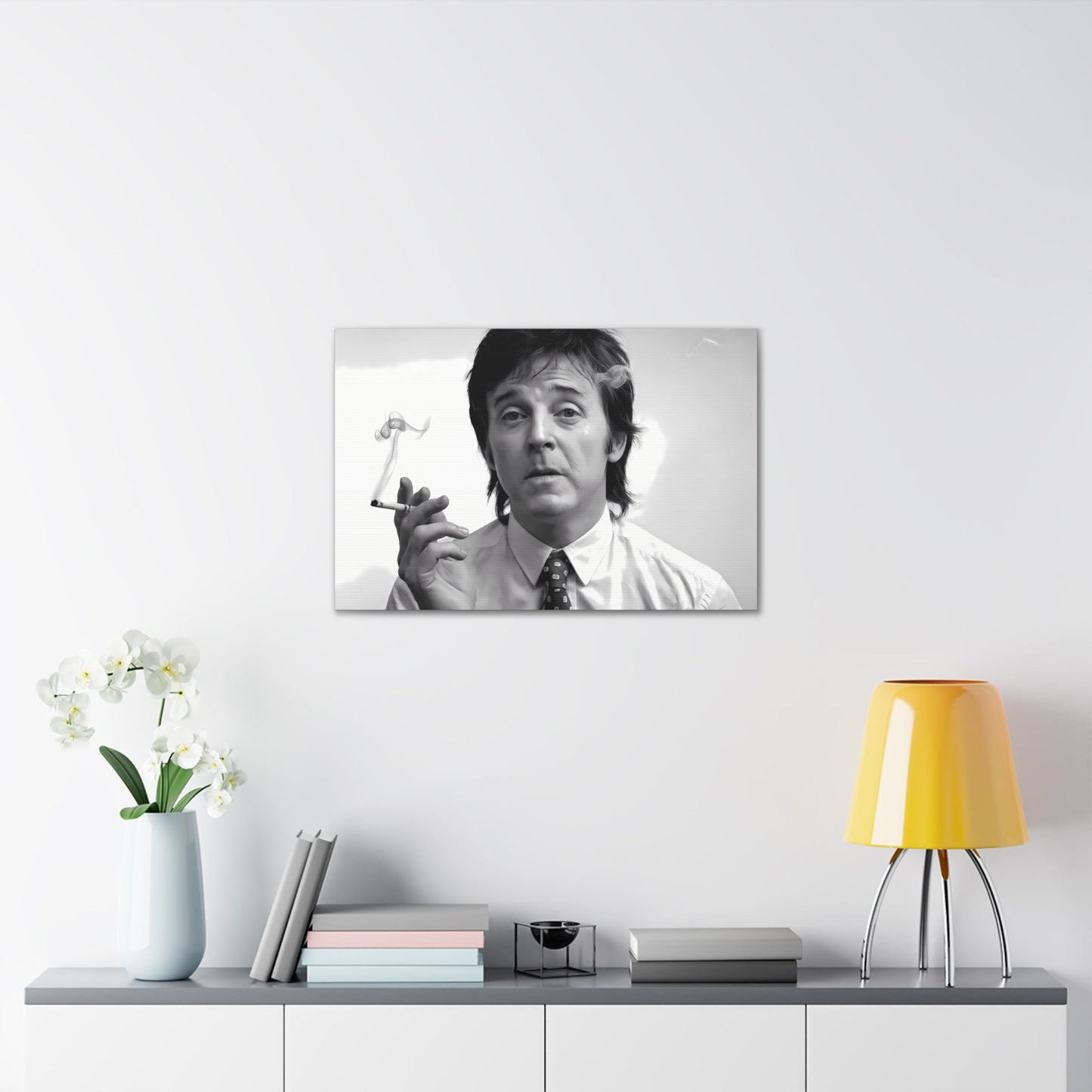 Black and white portrait of Paul McCartney with cigarette smoke, 1960s inspired modern wall art.