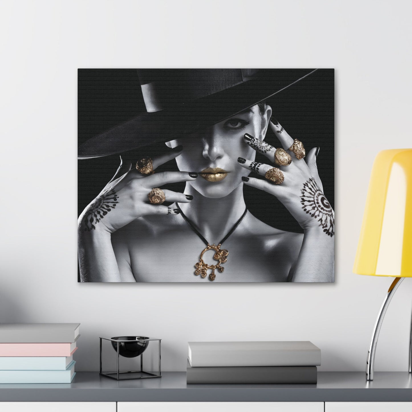 Vogue-inspired black and white portrait canvas with gold accents and mendhi designs, featuring a woman in a wide-brimmed hat, ideal for chic home or office decor.