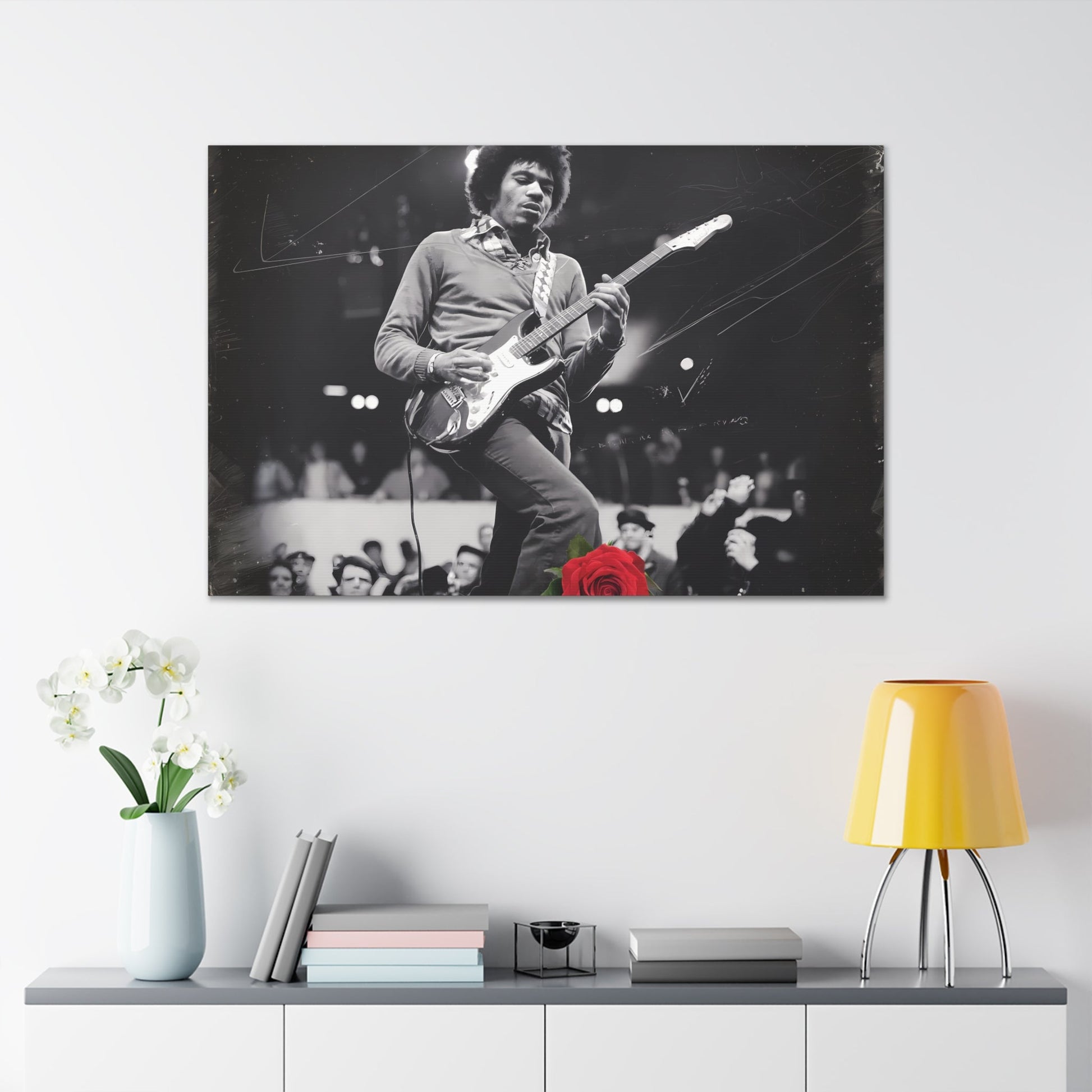 Jimi Hendrix Vintage PerformanceTimeless Passion: Jimi Hendrix Vintage Performance | Canvas Gallery WrCanvasJimi Hendrix Vintage Performance | Canvas Gallery Wrap | Iconic Rock Wall Art
Jimi Hendrix Vintage Photo Art - Black and White with Red Rose Accent
 Experience the r