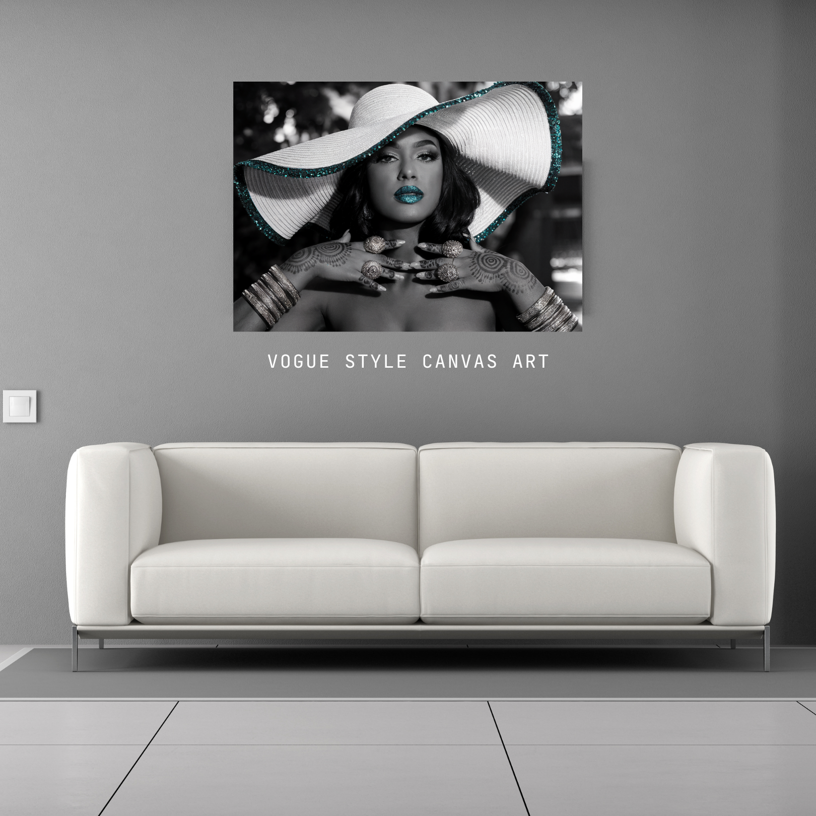 Black and white vogue portrait gallery canvas wrap on wall above sofa, showcasing elegant black woman with blue glitter lipstick and wide-brimmed hat.