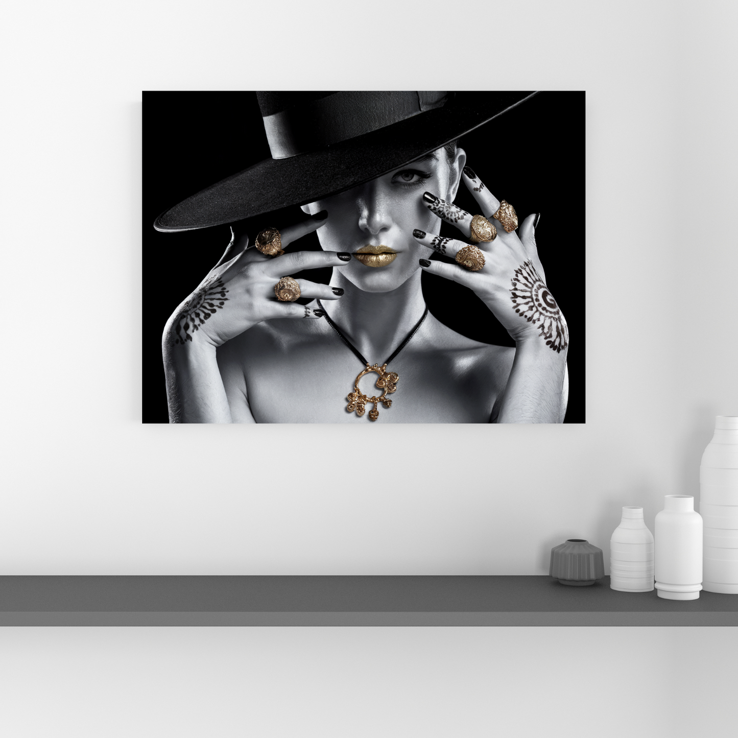 Vogue-inspired elegance black and white portrait canvas with gold accents hanging on a modern wall.