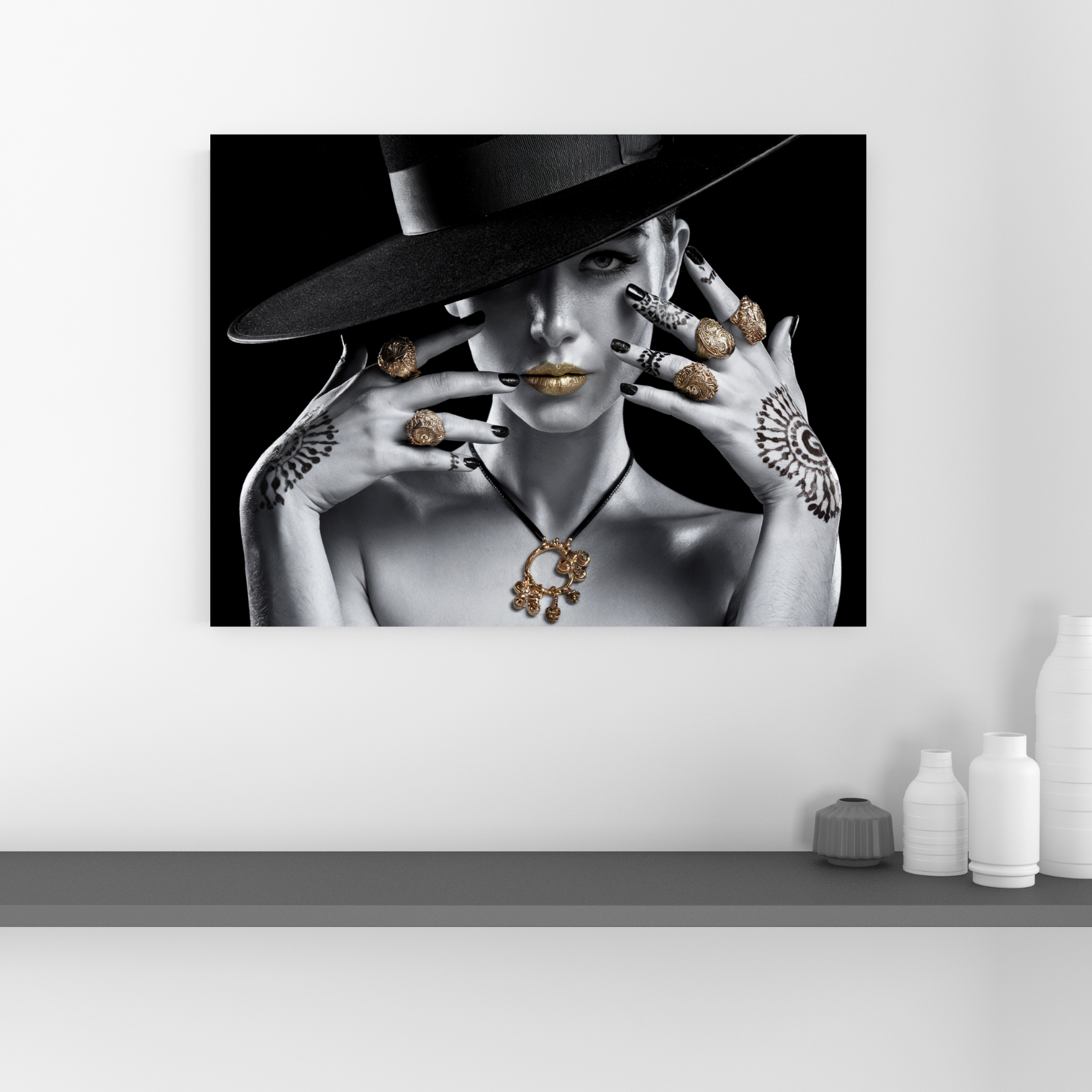 Vogue-inspired elegance black and white portrait canvas with gold accents hanging on a modern wall.