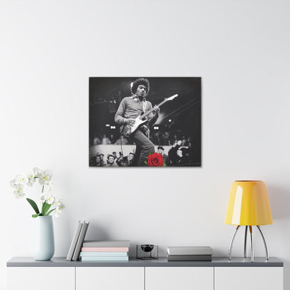 Jimi Hendrix Vintage PerformanceTimeless Passion: Jimi Hendrix Vintage Performance | Canvas Gallery WrCanvasJimi Hendrix Vintage Performance | Canvas Gallery Wrap | Iconic Rock Wall Art
Jimi Hendrix Vintage Photo Art - Black and White with Red Rose Accent
 Experience the r