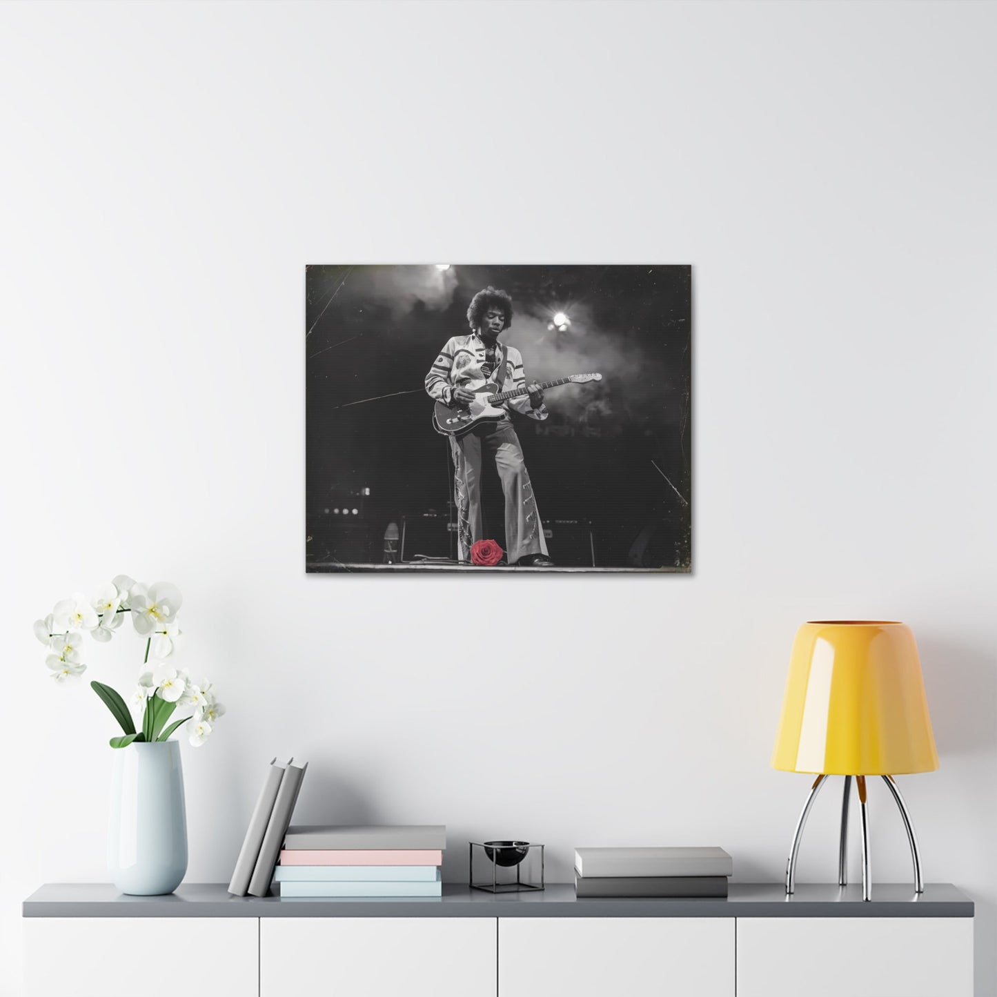 Jimi Hendrix Vintage PerformanceTimeless Passion: Jimi Hendrix Vintage Performance | Canvas Gallery WrCanvasJimi Hendrix Vintage Photo Art - Black and White with Red Rose Accent
Experience the raw energy of Jimi Hendrix through this unique vintage-style canvas. Bring the s