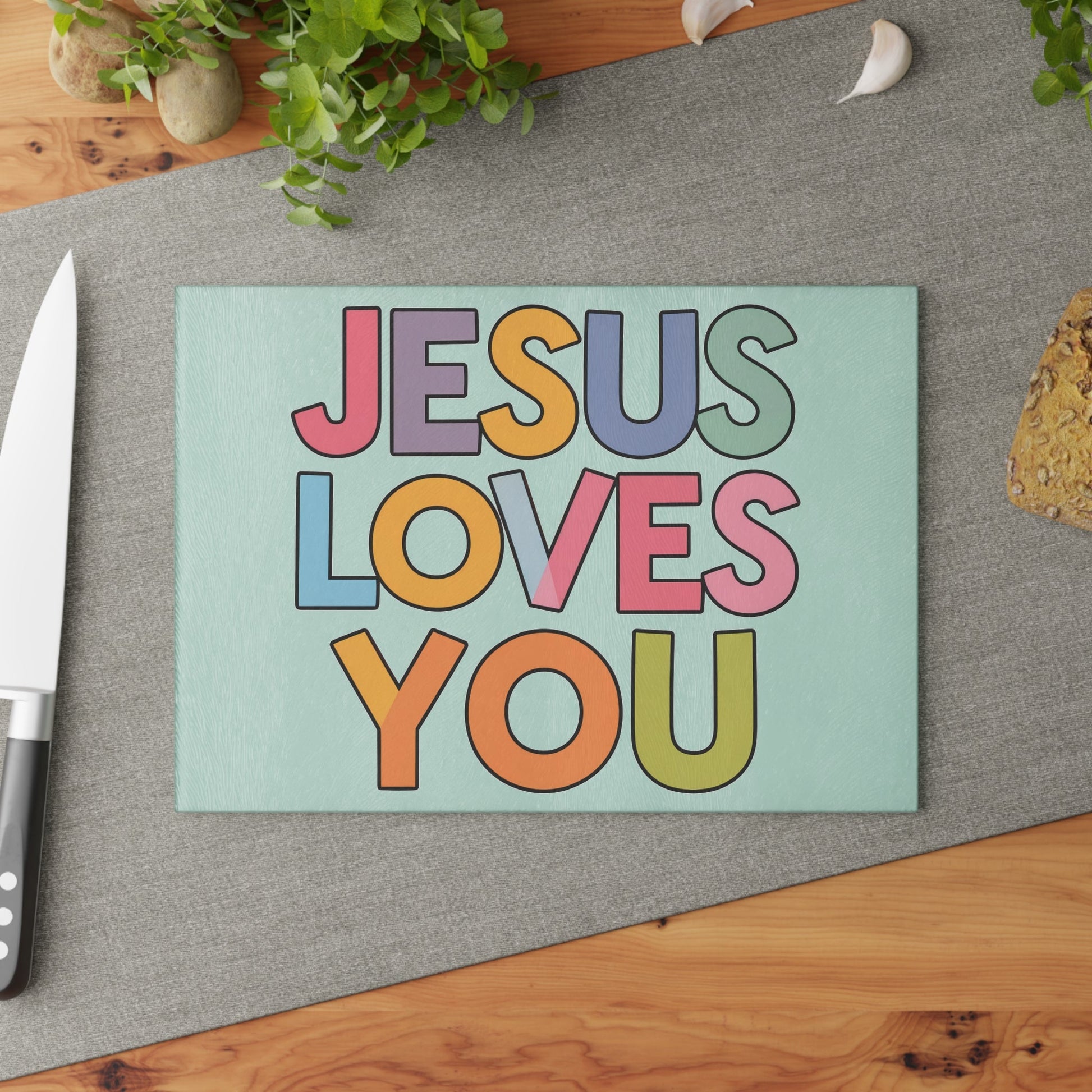 "JESUS LOVES YOU""JESUS LOVES YOU" Inspirational Christian Glass Cutting Board - ChristHome DecorElevate your kitchen with our stunning "JESUS LOVES YOU" glass cutting board. This beautiful and functional piece combines faith and practicality, making it perfect 