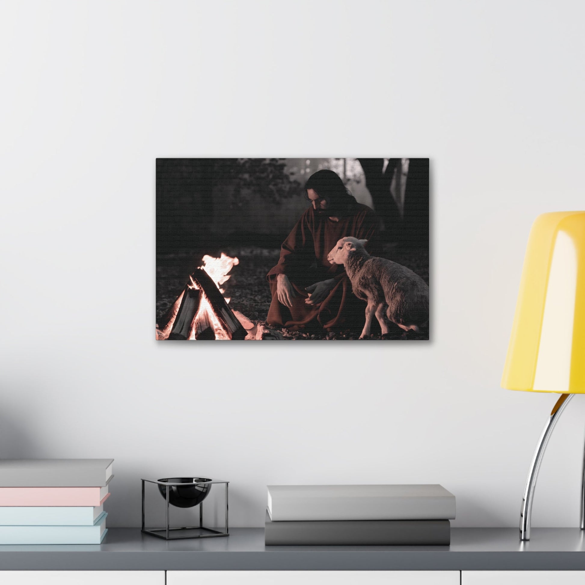 Christian wall art showing Jesus with the Lamb of God by a campfire.